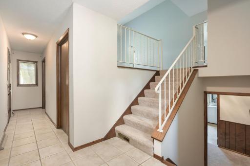 Front entrance with closet space leading to attached garage and back yard access