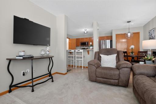 From the front door, you see 2 different eating options: counter and formal dining. If you don't need a dining room, it could be a nice office space