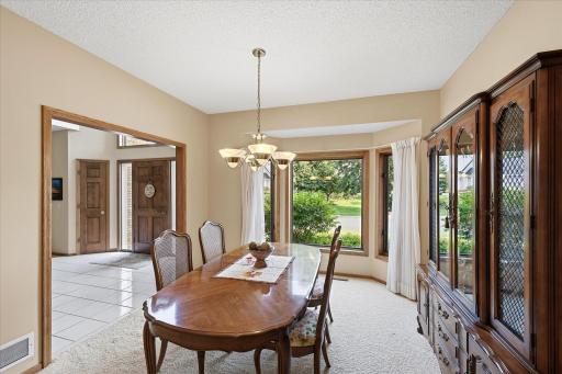 A dedicated formal dining area provides additional space for hosting meals and gatherings.