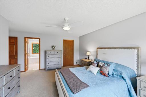A spacious walk-in closet provides generous storage just off the primary suite.