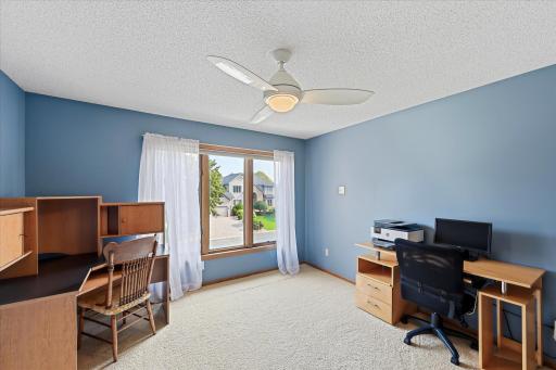 The third bedroom provides additional flexible space with a large closet for convenient storage.