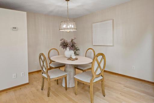 Dining room just off the kitchen, open yet still intimate.