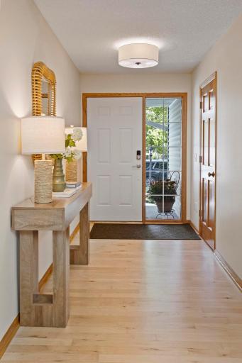 Wide entryway complete with coat closet and natural light.