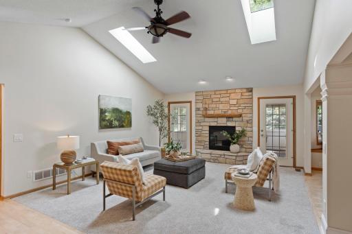 Photo for 2452 Eagle Valley Drive, Woodbury, MN 55129 - listing #7137391 Vaulted ceilings and drenched with light in the living room