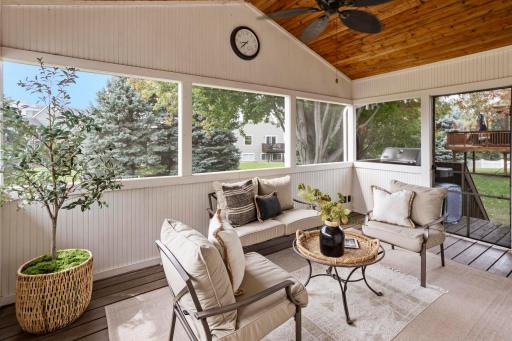 Access to backyard via steps off small deck, which is complete with a gas line for a grill.