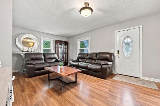 Comfortable living area filled with natural light, creating a warm and welcoming atmosphere.