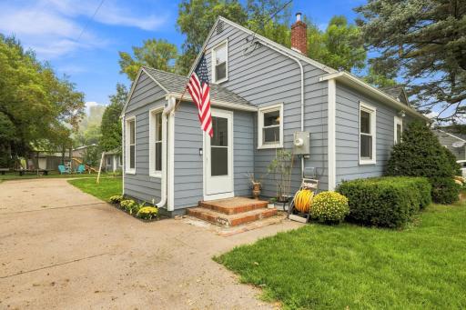 Classic charm meets exceptional curb appeal with a beautifully maintained exterior, mature landscaping, and a welcoming entry.