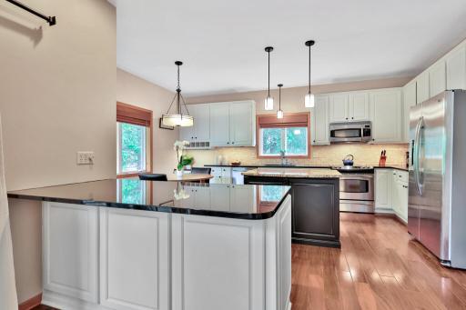 Hardwood floors and stainless steel appliances