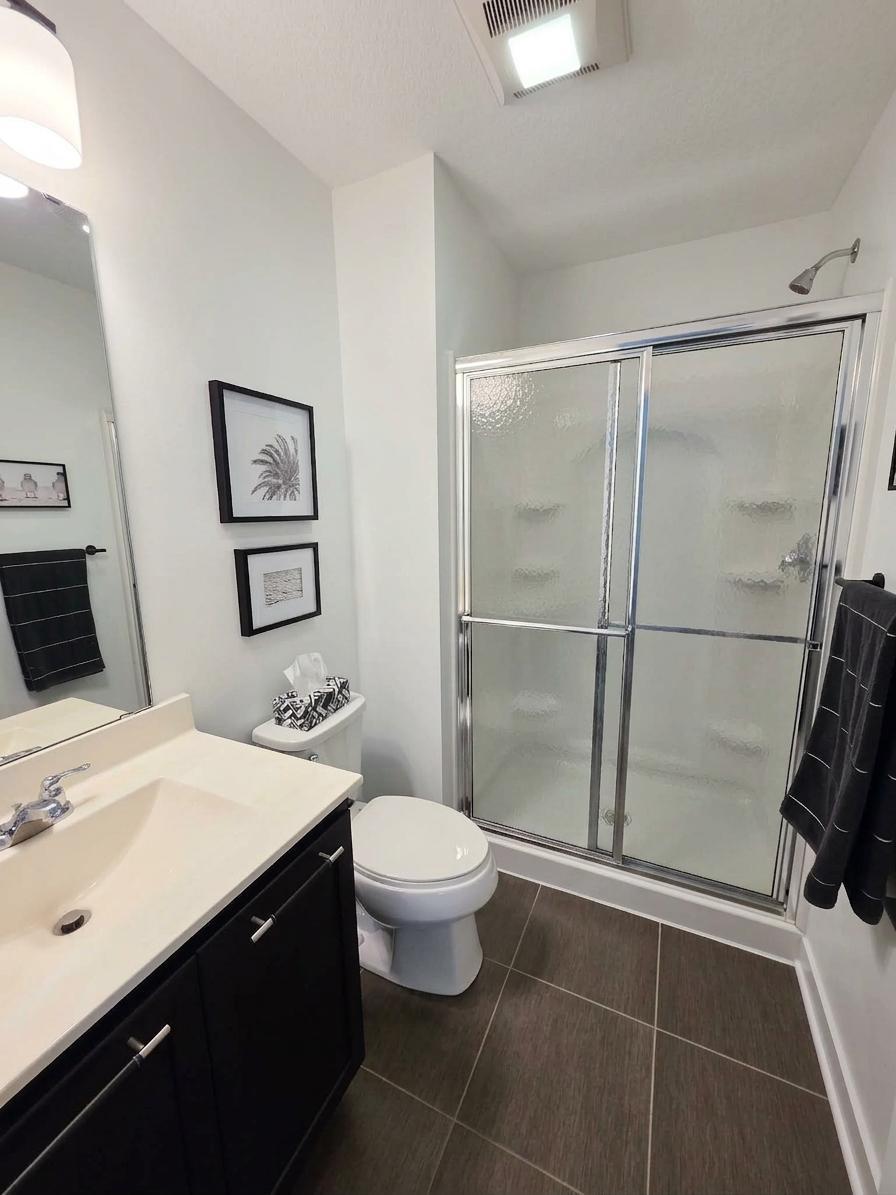 Lower-level 3/4 bath provides added convenience for the recreation level.