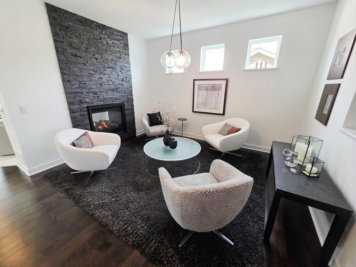 Cocktail lounge on the opposite side of the two-sided fireplace creates a distinctive second gathering space.