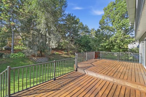 Bring on the furniture, fire table, grill and all your friends & family. This newer extra large deck (30 x 14) can handle it all!