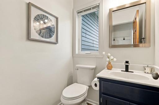 1/2 bath on the main just off the garage entrance