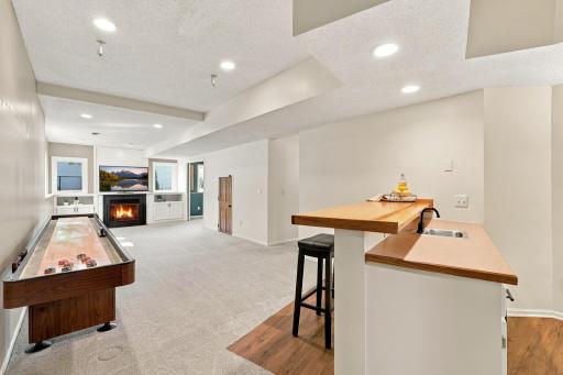 Tall ceilings and big windows make the lower level feel spacious
