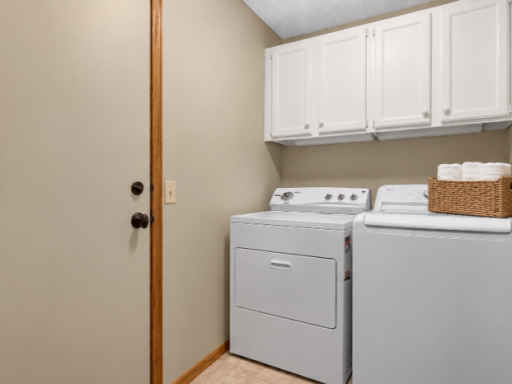 Main floor laundry room/mudroom provides easy access to the garage
