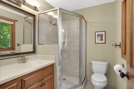 Owner's en-suite 3/4 bath - tiled shower & updated countertop