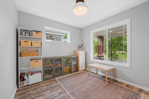 Main level bonus room which is great for extra play space or an office