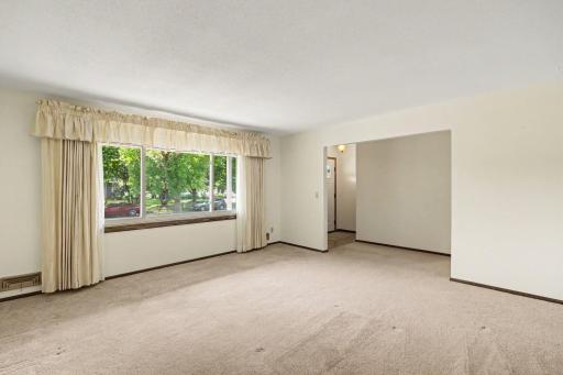 picture window overlooks neighborhood