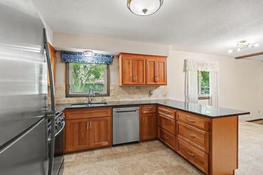 cherry cabinets, granite counters