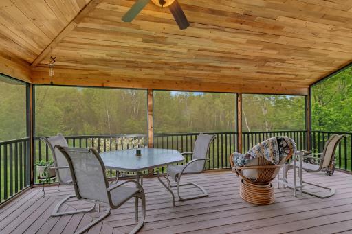 massive L-shaped screened in deck