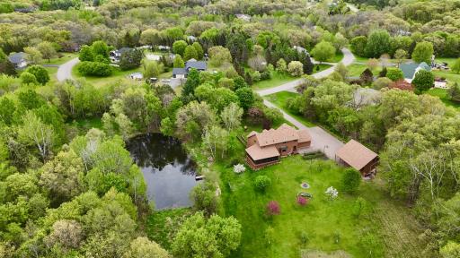 view of backyard with pond