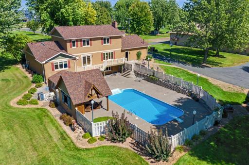 Backside pool with huge patio and pool hut