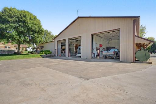 3 bays on the side of shop with 14 foot tall doors