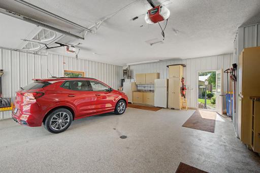 Attached heated garage with epoxy floor and drain