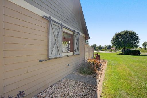 Backside of pool hut and landscaping