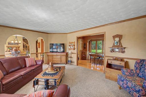Arch ways add character and charm to this large living space