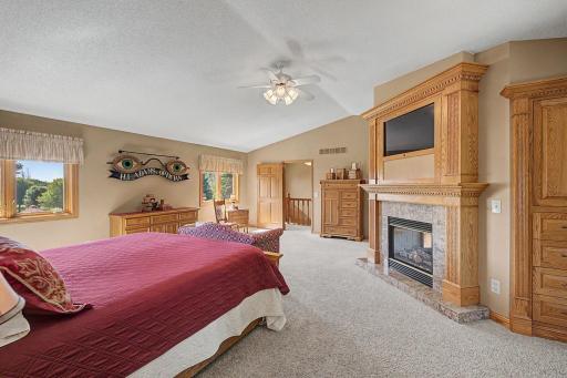 Large primary suite with double sided fireplace