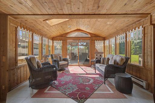 Cedar lined sunroom with skylight and windows galore.