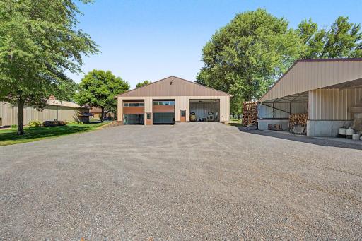 South view of driveway and Massive shed/shop