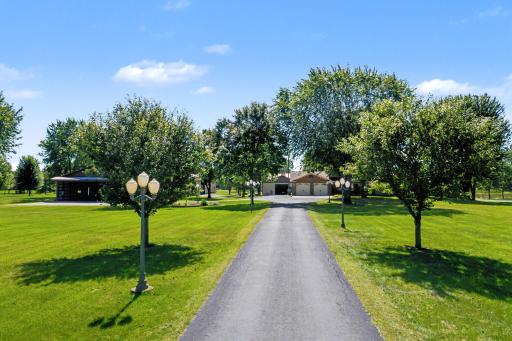 Street lights line the driveway and automatically go on and off