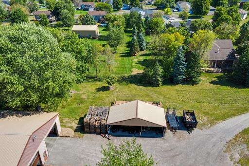 Storage shed with retractable roof with 4 foot poured cement walls