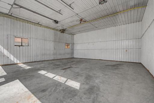 1st bay with two doors south end of massive building
