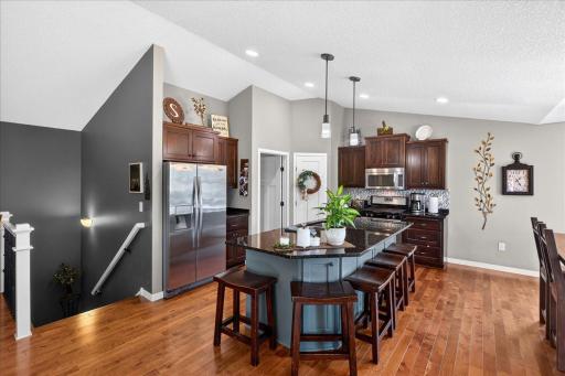 The Kitchen Island Creates a Natural Gathering Place