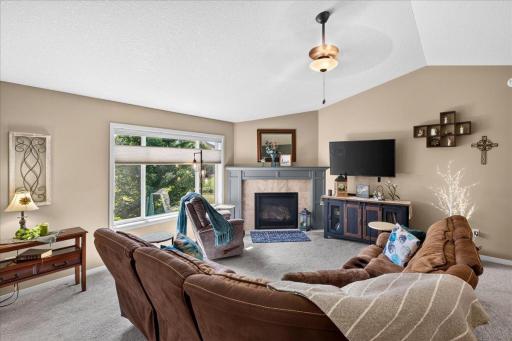 Gather Around the Fireplace in the Vaulted Living Room