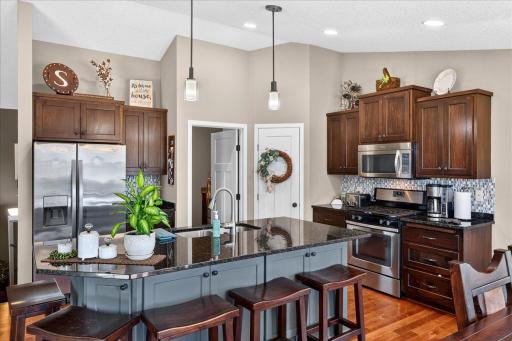 Granite Countertops and Abundant Cabinetry Complete the Kitchen