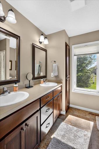 Natural Light Brightens the Private Suite Bathroom