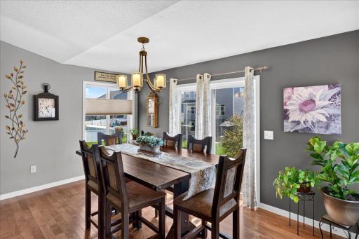 A Sunlit Dining Area Overlooking the Backyard