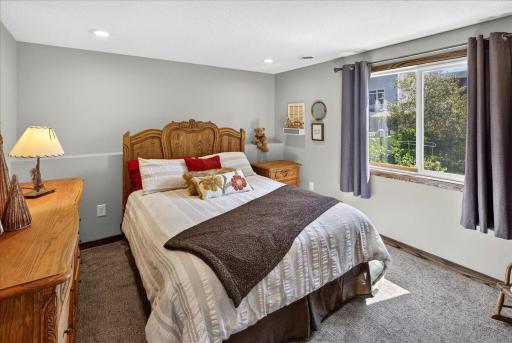 A Bright Lower-Level Bedroom Offers Comfort and Natural Light