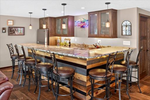 A Custom Lower-Level Bar Becomes the Heart of Every Gathering