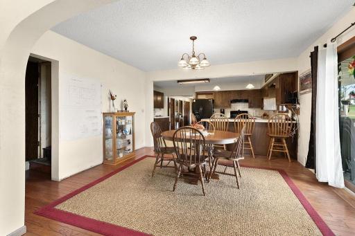 Another view of the kitchen & dining