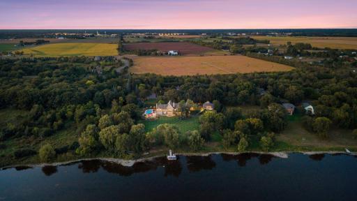 Timeless architecture and exceptional craftsmanship define this one-of-a-kind riverfront residence.