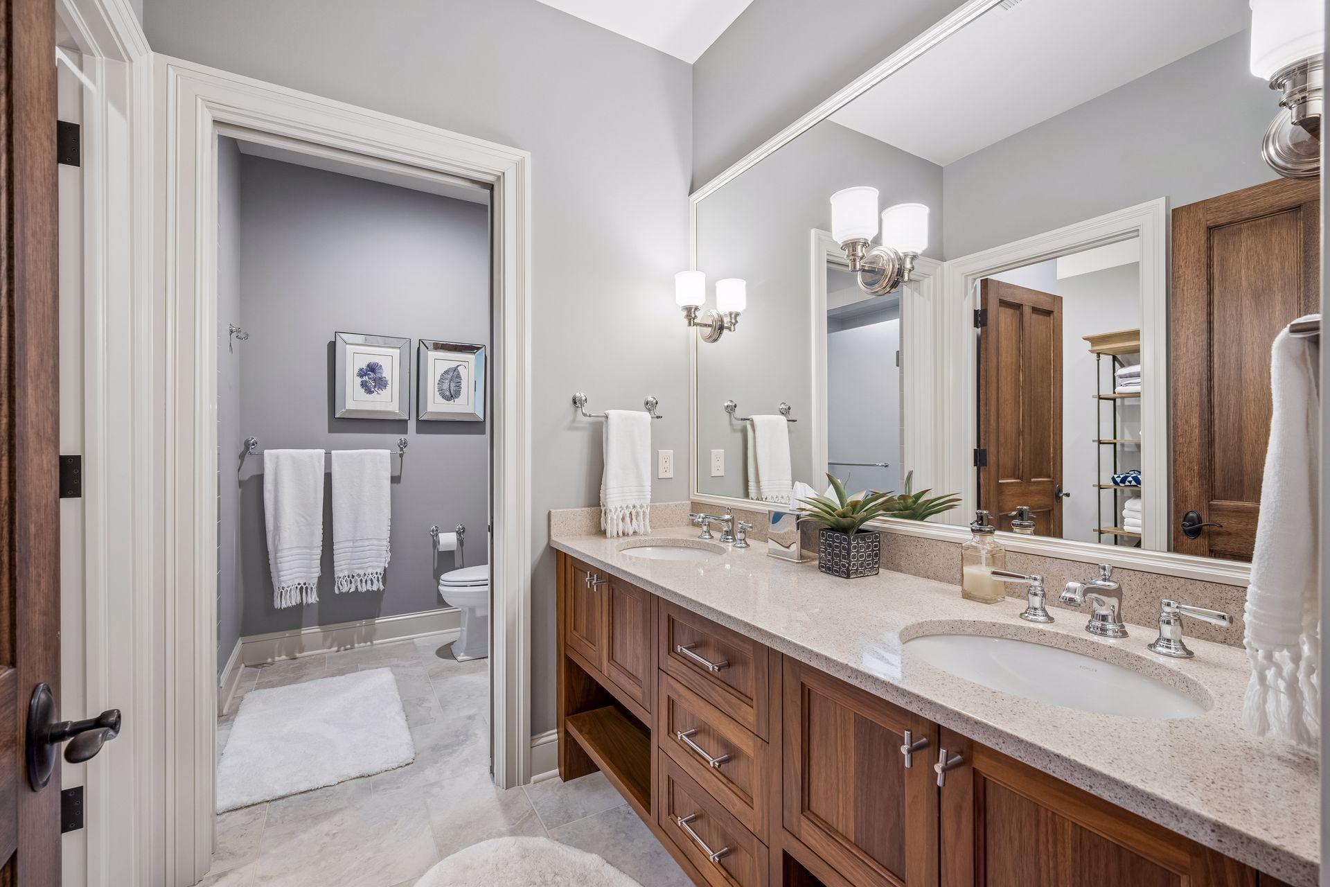 A full lower-level bath is conveniently positioned near the pool entrance.