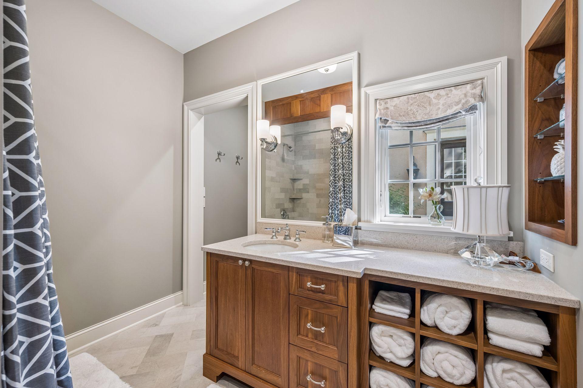 Beautifully appointed and thoughtfully located, the full bath provides easy access for guests enjoying the pool and outdoor spaces.