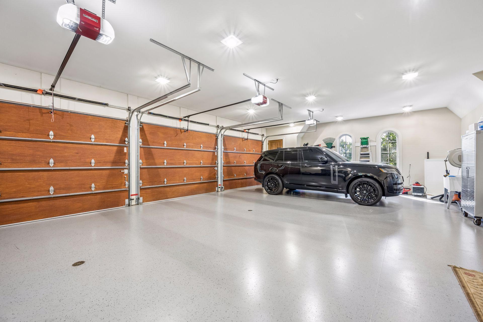 Fourteen total garage stalls create extraordinary capacity for automobiles, collections, and hobbies.