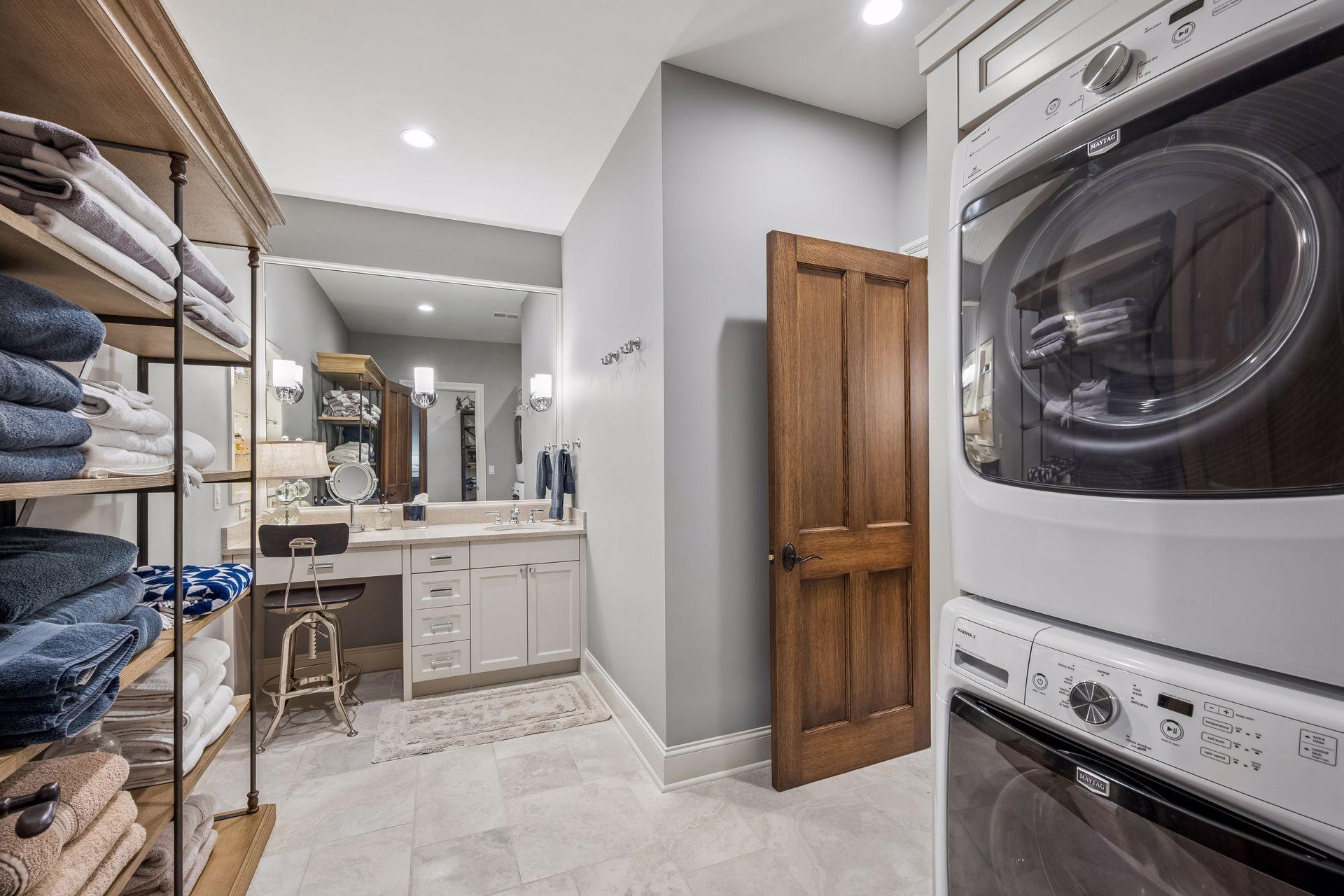 An additional washer and dryer near the pool make summer entertaining exceptionally practical.