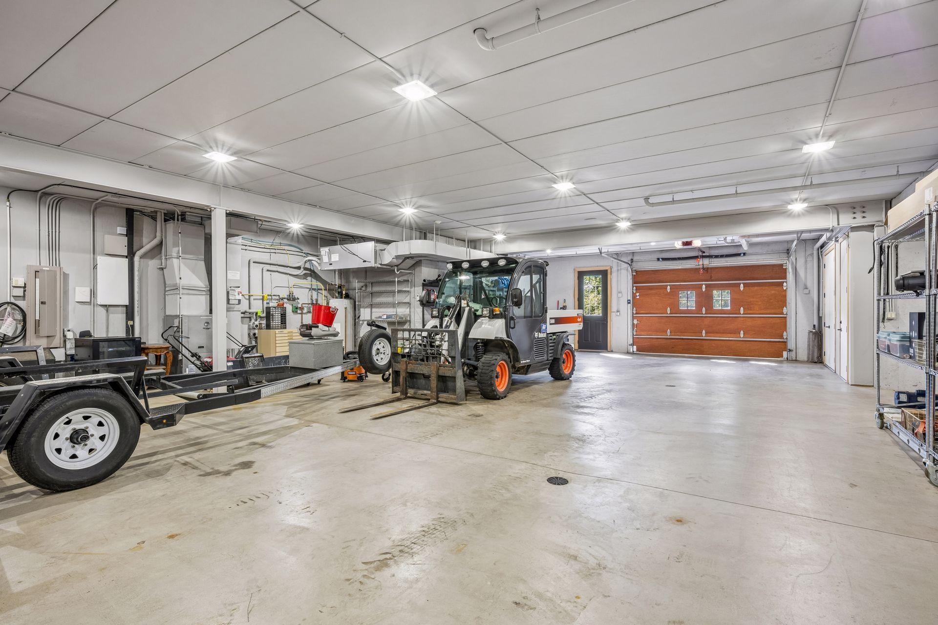 This estate offers two tuck-under garages, expanding the property's already remarkable storage and vehicle capacity.