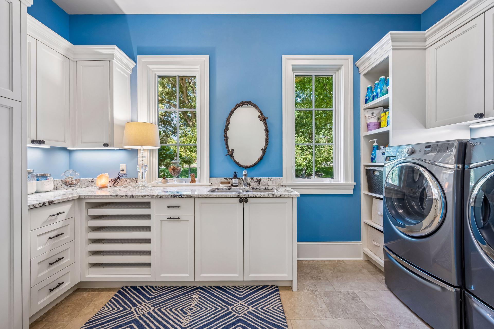 Thoughtfully positioned main-level laundry adds everyday convenience.
